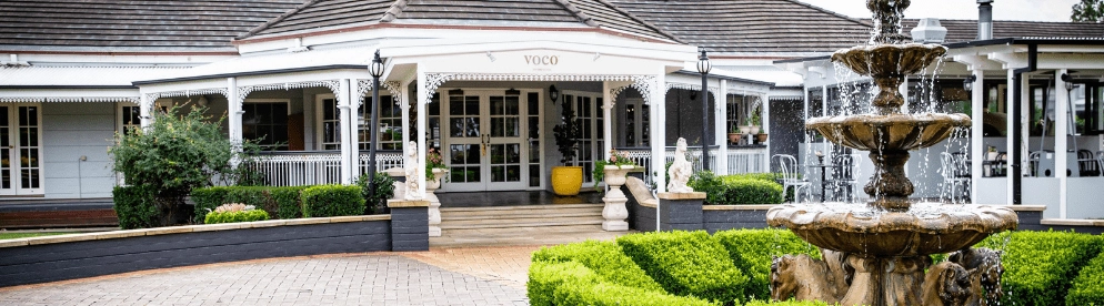 Exterior of the Audrey Wilkinson tasting room with water fountain